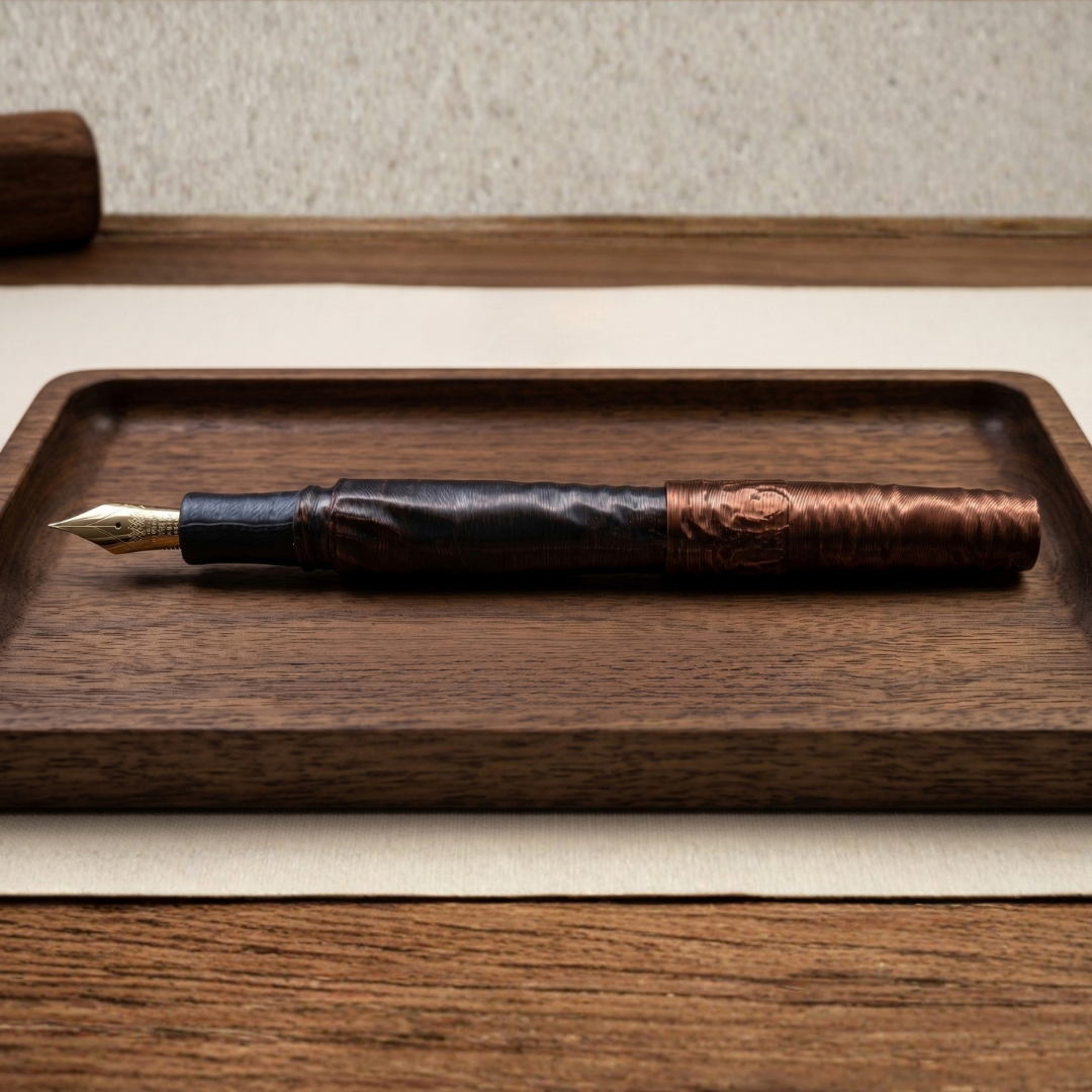 Penna Wave stilografica nel colore bronzo e nero